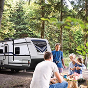 2019 Venture RV SportTrek ST271VMB Travel Trailer with Family at Outdoor Picnic