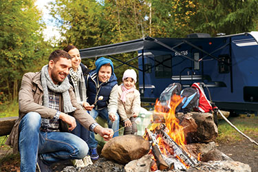 Stratus SR261VRK Travel Trailer with Family at Campfire