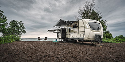 2020 Venture RV SportTrek Touring Edition STT343VIK Travel Trailer Exterior at lakeside campsite