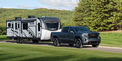 2023 Venture RV SportTrek Touring Edition STT333VMI Travel Trailer with Tow Vehicle Vertical