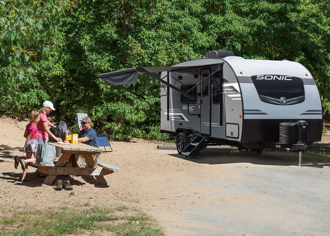 2023 Venture RV Sonic SN190VRB Travel Trailer with Family at Campground