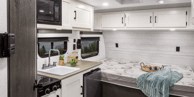 2026 Venture RV Sienna CB130CRD Travel Trailer Kitchen and Bed