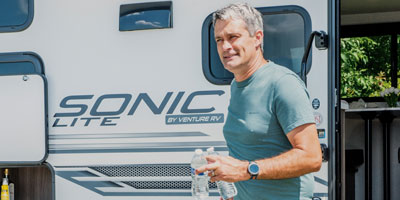 2025 Venture RV Sonic Lite SL169VUD Travel Trailer Lifestyle Exterior 1