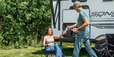 2025 Venture RV Sonic Lite SL169VUD Travel Trailer Lifestyle Exterior 2
