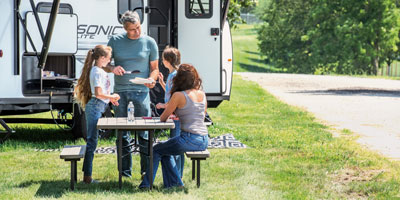 2025 Venture RV Sonic Lite SL169VUD Travel Trailer Lifestyle Exterior Grilling 5