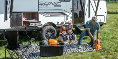 2025 Venture RV Sonic Lite SL169VUD Travel Trailer Lifestyle Exterior Halloween 4