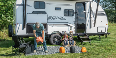2025 Venture RV Sonic Lite SL169VUD Travel Trailer Lifestyle Exterior Halloween 5