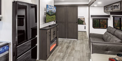 2026 Venture RV SportTrek STF312VTB Fifth Wheel Kitchen and Living Room