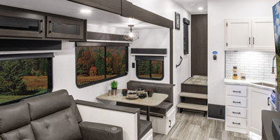 2026 Venture RV SportTrek STF312VTB Fifth Wheel Living Room and Kitchen