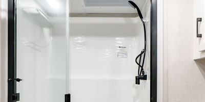 2025 Venture RV SportTrek Touring Edition STTF354VBH Fifth Wheel Glass Door Shower Surround Master Bathroom