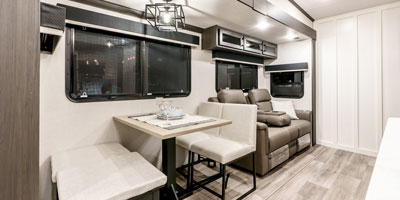 2025 Venture RV SportTrek Touring Edition STTF354VBH Fifth Wheel Slide Table, Bench and Chairs Dinette and Theater Seats