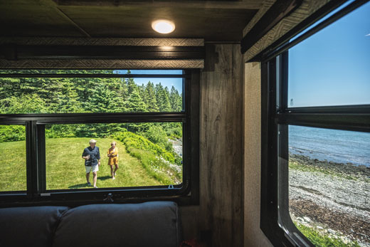 Venture RV SportTrek Touring Edition Luxury Fifth Wheel at Campsite