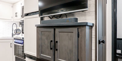 2025 Venture RV SportTrek Touring Edition STT292VRB Travel Trailer Entertainment Center Television, Electric Fireplace and Soundbar