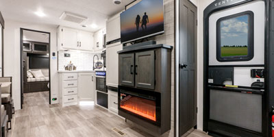 2025 Venture RV SportTrek Touring Edition STT292VRB Travel Trailer Living Room Electric Fireplace, TV and Walk-in Pantry