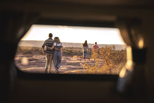 Venture RV SportTrek Touring Edition Luxury Travel Trailer at Campsite