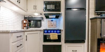 2025 Venture RV SportTrek ST292VBH Travel Trailer Kitchen Cabinets