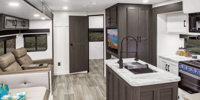2026 Venture RV SportTrek ST327VIK Travel Trailer Kitchen and Living Room
