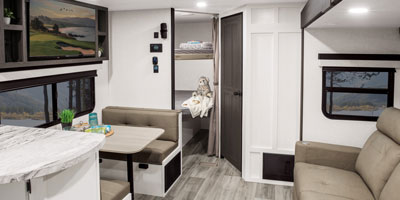 2026 Venture RV Stratus SR302VBH Travel Trailer Dinette and Living Room